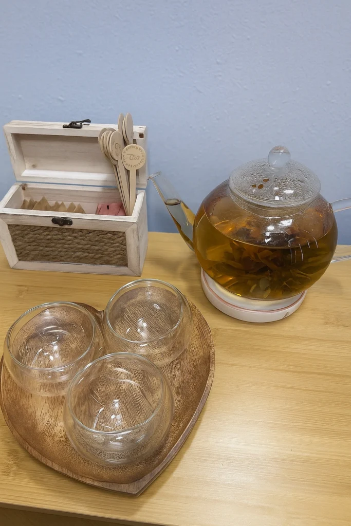 Tea station and relaxation corner at Dettycated Head Spa Northridge with herbal teas and natural skincare products